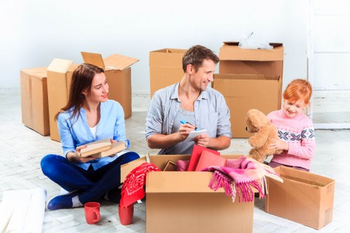 Removal van loading items for a house move under service terms