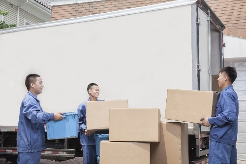Furniture and boxes being loaded for a Knightsbridge delivery
