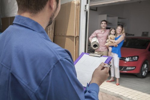 Careful loading of furniture into a moving van in Knightsbridge